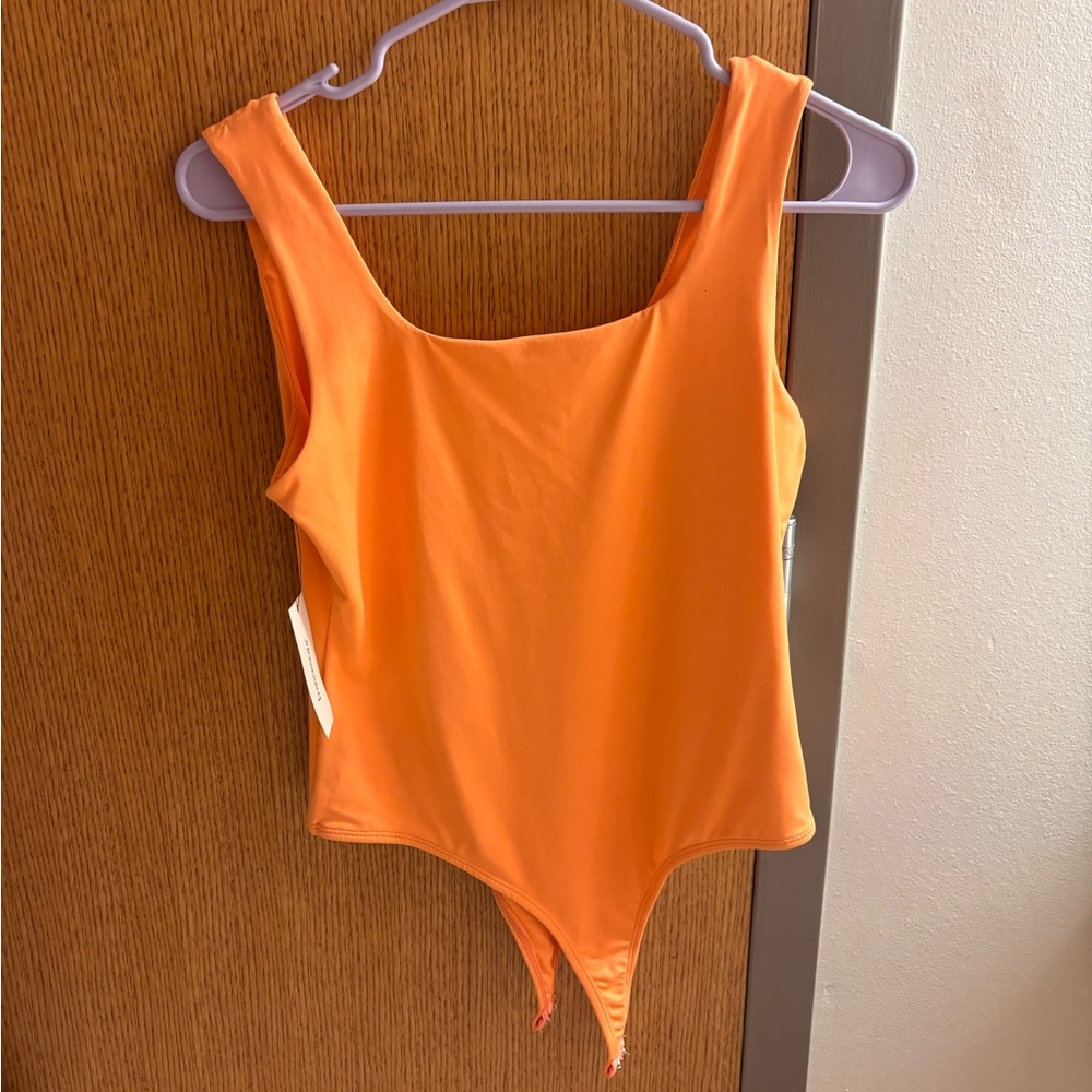 Francesca's Collections Bright Orange Scoop One-Piece Swimsuit